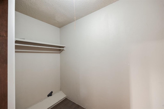 325 S Pine St, Crescent, OK 73028 - washroom featuring dark wood-style floors and a textured ceiling