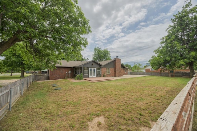 325 S Pine St, Crescent, OK 73028 - view of yard with french doors and a patio