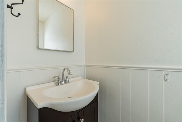 3913 SE 54th St, Oklahoma City, OK 73135 - bathroom with vanity and wainscoting