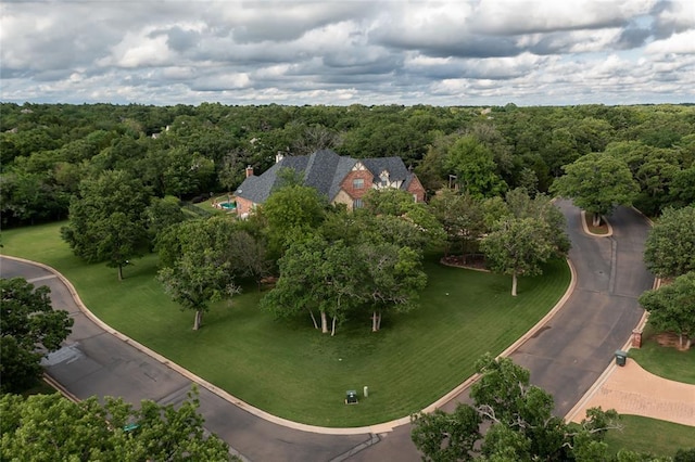 8025 Redbud Canyon Trl, Edmond, OK 73034 - aerial overview of property's location featuring a heavily wooded area