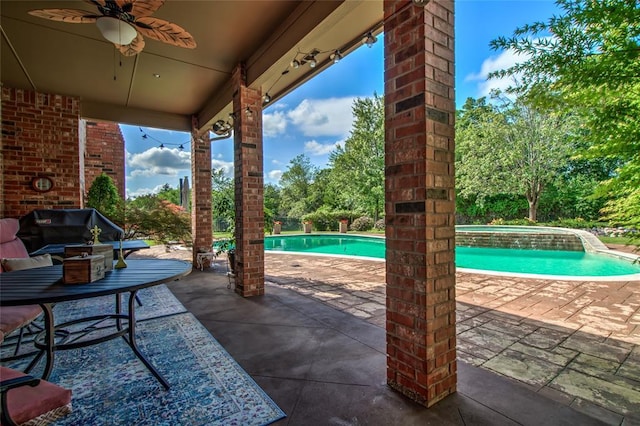 8025 Redbud Canyon Trl, Edmond, OK 73034 - view of patio featuring a ceiling fan, an outdoor pool, and a jacuzzi