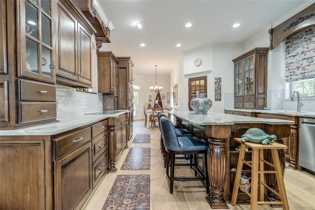 8025 Redbud Canyon Trl, Edmond, OK 73034 - bar area featuring backsplash, recessed lighting, dishwasher, a chandelier, and a sink