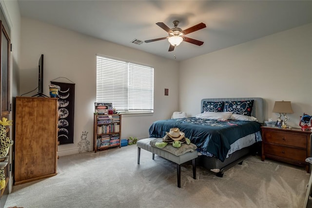 8025 Redbud Canyon Trl, Edmond, OK 73034 - bedroom with carpet, a ceiling fan, and baseboards