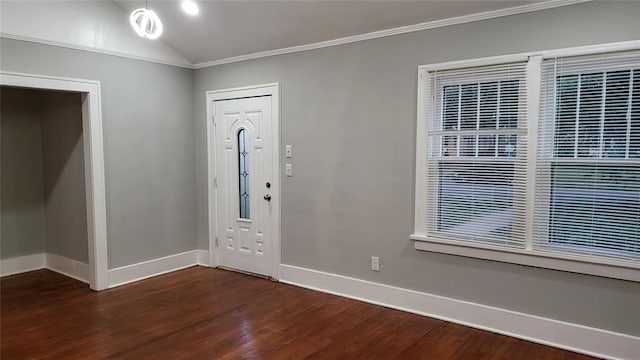 929 NE 17th St, Oklahoma City, OK 73105 - entryway featuring dark wood-style flooring, crown molding, baseboards, and vaulted ceiling