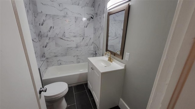 929 NE 17th St, Oklahoma City, OK 73105 - bathroom featuring toilet, vanity, bathtub / shower combination, and tile patterned flooring