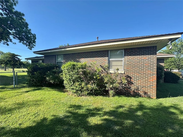 1618 NW 24th St, Lawton, OK 73505 - view of side of property featuring brick siding