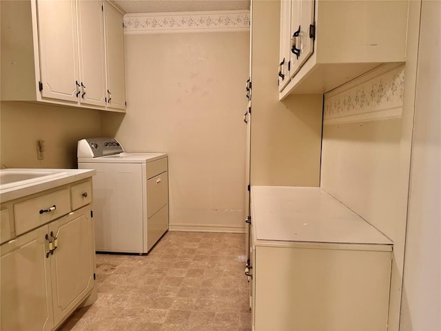 1618 NW 24th St, Lawton, OK 73505 - washroom featuring washer / dryer and cabinet space