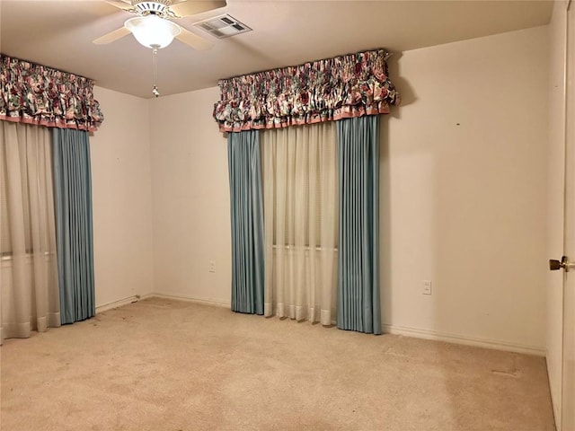 1618 NW 24th St, Lawton, OK 73505 - carpeted empty room with a ceiling fan and baseboards