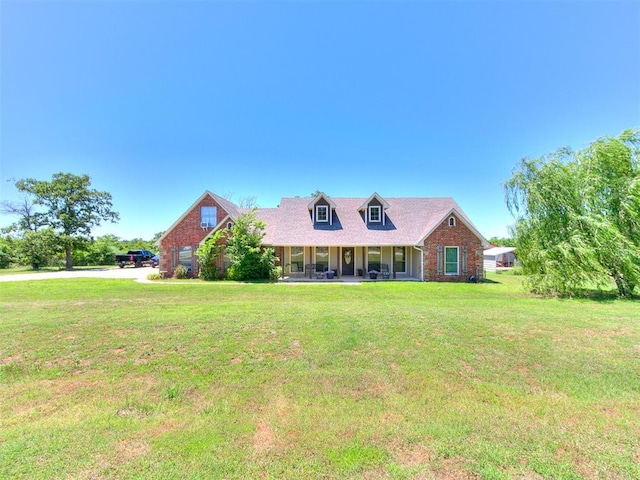 5509 Old Town St, Newalla, OK 74857 - view of front of home with covered porch and a front lawn