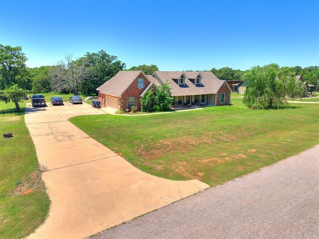 5509 Old Town St, Newalla, OK 74857 - cape cod house with covered porch, a garage, driveway, and a front lawn