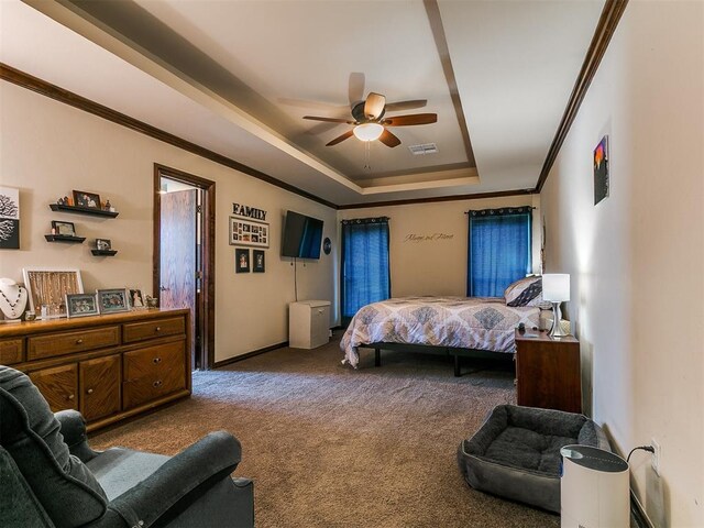 5509 Old Town St, Newalla, OK 74857 - bedroom featuring a raised ceiling, carpet floors, ornamental molding, ceiling fan, and baseboards