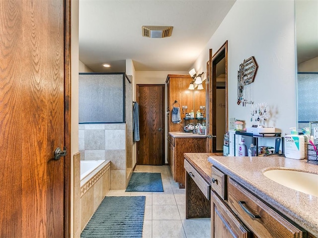 5509 Old Town St, Newalla, OK 74857 - full bath with a stall shower, tile patterned floors, two vanities, and a bath
