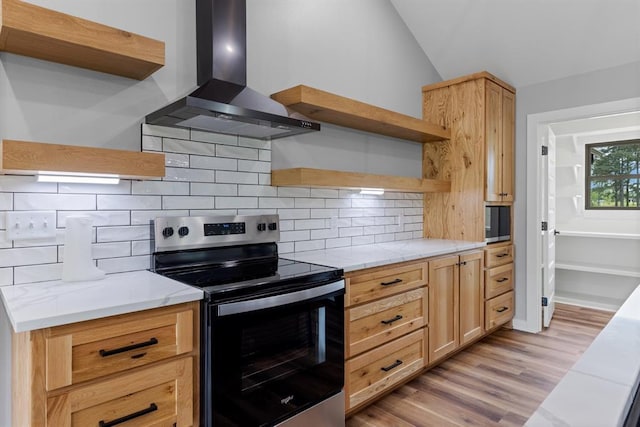 3155 E Fair St, Idabel, OK 74745 - kitchen featuring open shelves, electric stove, extractor fan, tasteful backsplash, and light countertops