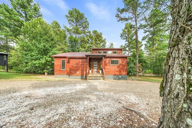 168 Eagle Mountain Trl, Broken Bow, OK 74728 - rear view of house with driveway