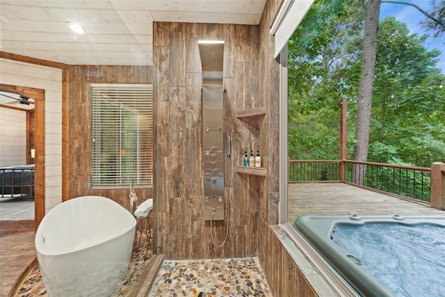 168 Eagle Mountain Trl, Broken Bow, OK 74728 - full bathroom with a freestanding bath and wood walls