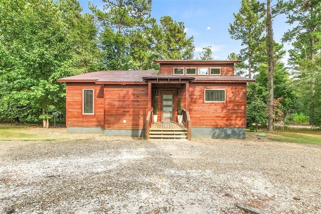 168 Eagle Mountain Trl, Broken Bow, OK 74728 - chalet / cabin featuring metal roof, crawl space, and driveway