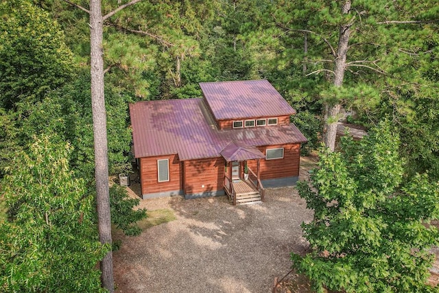 168 Eagle Mountain Trl, Broken Bow, OK 74728 - chalet / cabin featuring metal roof, driveway, and a wooded view