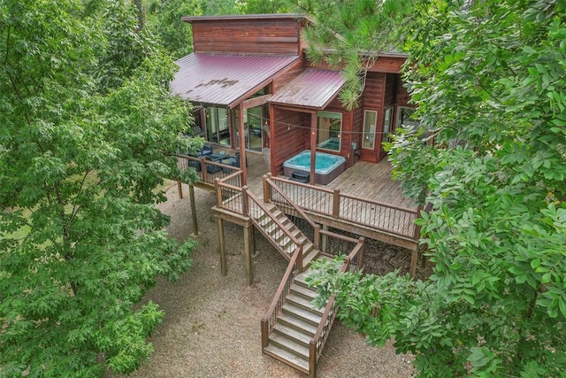 168 Eagle Mountain Trl, Broken Bow, OK 74728 - view of playground featuring stairway and a wooden deck