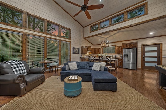 168 Eagle Mountain Trl, Broken Bow, OK 74728 - living room featuring high vaulted ceiling, a ceiling fan, wood walls, and dark wood-type flooring