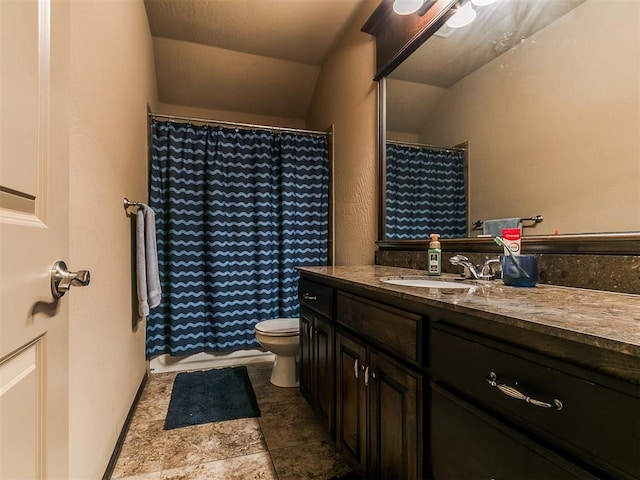 17016 Barcelona Dr, Oklahoma City, OK 73170 - full bathroom featuring toilet, vanity, vaulted ceiling, stone finish floors, and a shower with shower curtain