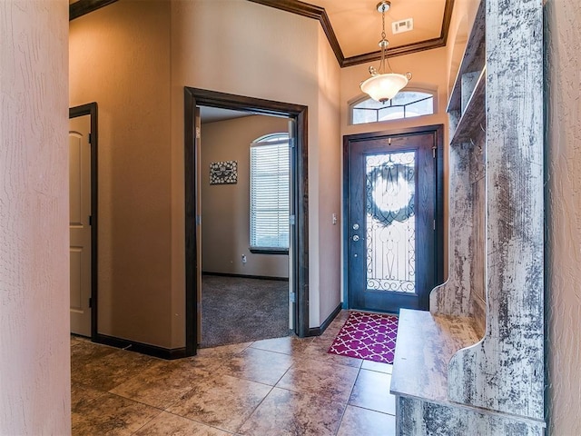 17016 Barcelona Dr, Oklahoma City, OK 73170 - tiled entrance foyer featuring ornamental molding and baseboards
