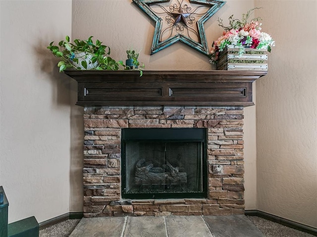 17016 Barcelona Dr, Oklahoma City, OK 73170 - detailed view of baseboards and a fireplace