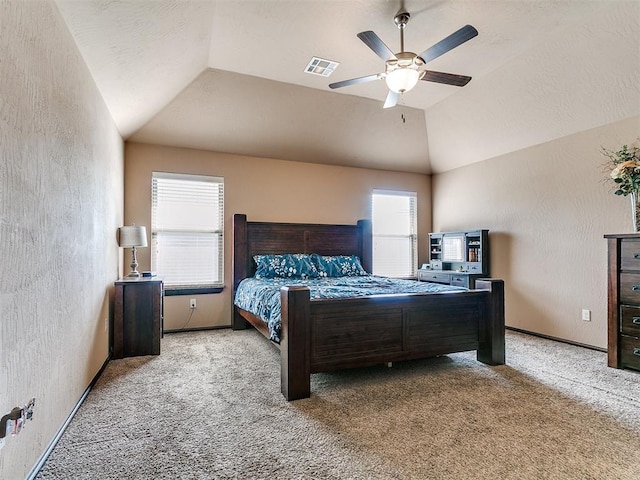 17016 Barcelona Dr, Oklahoma City, OK 73170 - bedroom featuring multiple windows, lofted ceiling, carpet floors, a textured wall, and a ceiling fan