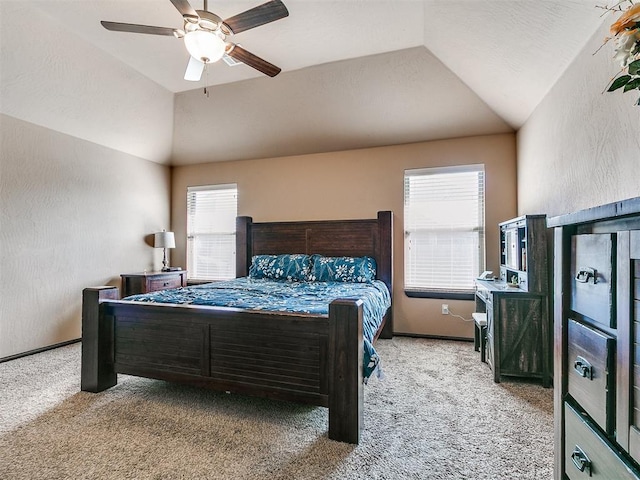 17016 Barcelona Dr, Oklahoma City, OK 73170 - carpeted bedroom with lofted ceiling, a ceiling fan, and a textured wall