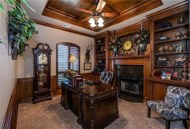 16000 SW 25th St, Oklahoma City, OK 73036 - home office with ceiling fan, carpet, a high end fireplace, wainscoting, and built in features