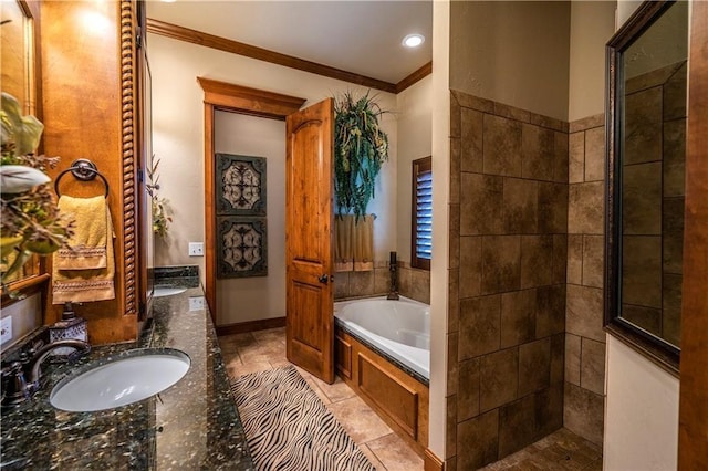 16000 SW 25th St, Oklahoma City, OK 73036 - full bathroom featuring crown molding, a garden tub, walk in shower, double vanity, and baseboards