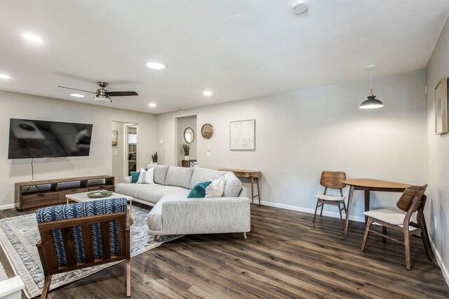 9800 Hummingbird Ln, Oklahoma City, OK 73162 - living room featuring baseboards, dark wood-style flooring, and recessed lighting