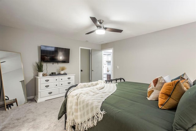 9800 Hummingbird Ln, Oklahoma City, OK 73162 - bedroom featuring light colored carpet, ceiling fan, and baseboards