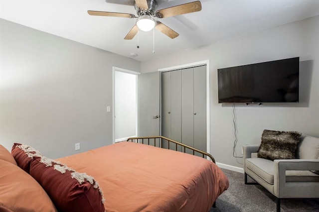 9800 Hummingbird Ln, Oklahoma City, OK 73162 - carpeted bedroom with a closet, baseboards, and a ceiling fan