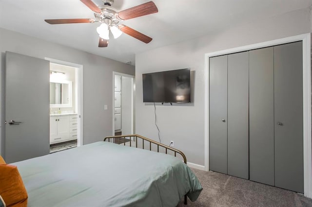 9800 Hummingbird Ln, Oklahoma City, OK 73162 - bedroom with carpet, a closet, ensuite bath, a ceiling fan, and baseboards