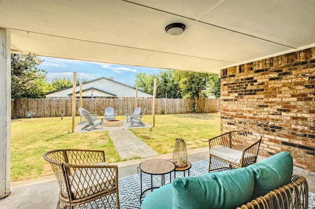 9800 Hummingbird Ln, Oklahoma City, OK 73162 - view of patio featuring an outdoor living space with a fire pit