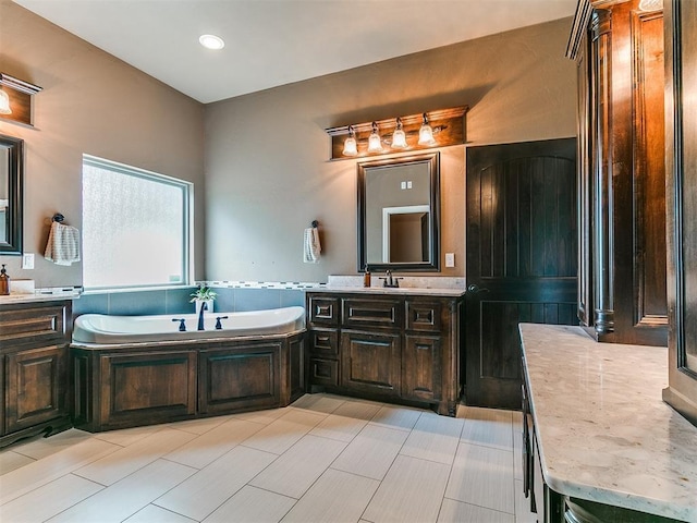 4216 SE 86th Pl, Oklahoma City, OK 73135 - bathroom with a bath, vanity, and recessed lighting