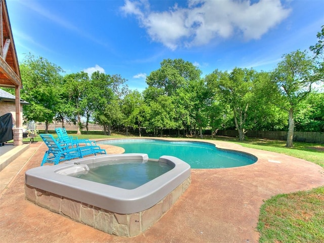 4216 SE 86th Pl, Oklahoma City, OK 73135 - view of swimming pool with a patio and a pool with connected hot tub
