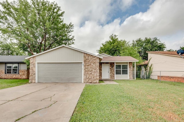 812 NW 113th St, Oklahoma City, OK 73114 - mid-century modern home featuring stone siding, a garage, and driveway