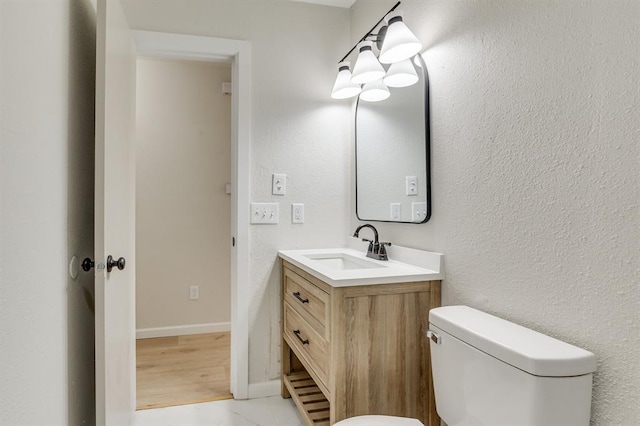 812 NW 113th St, Oklahoma City, OK 73114 - bathroom with vanity and toilet