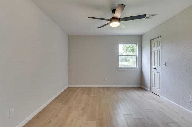 812 NW 113th St, Oklahoma City, OK 73114 - empty room with ceiling fan, light wood finished floors, and baseboards