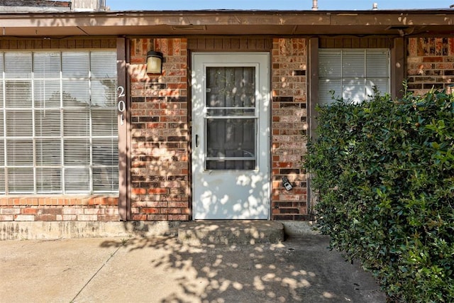 201 Kathleen Dr, Midwest City, OK 73110 - entrance to property with brick siding