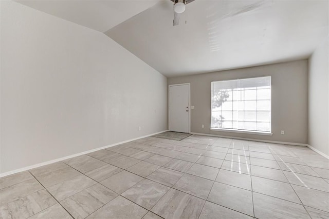 201 Kathleen Dr, Midwest City, OK 73110 - empty room featuring lofted ceiling, light tile patterned floors, a ceiling fan, and baseboards
