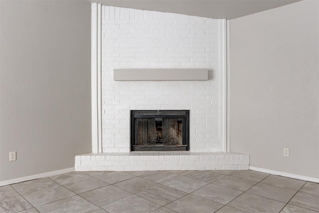 201 Kathleen Dr, Midwest City, OK 73110 - detailed view of a brick fireplace and baseboards