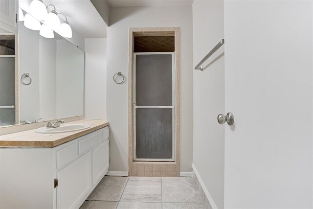 201 Kathleen Dr, Midwest City, OK 73110 - full bath with vanity, a shower stall, and baseboards