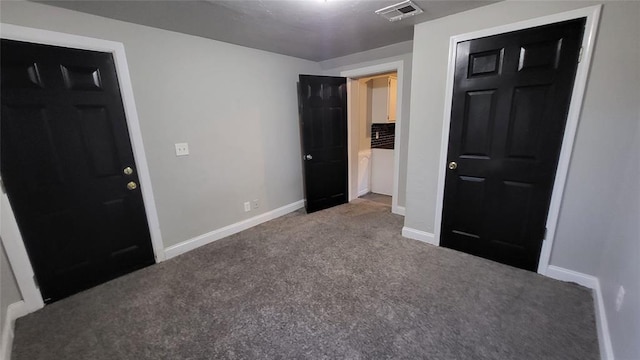 929 NE 21st St, Oklahoma City, OK 73105 - unfurnished bedroom with carpet floors and baseboards