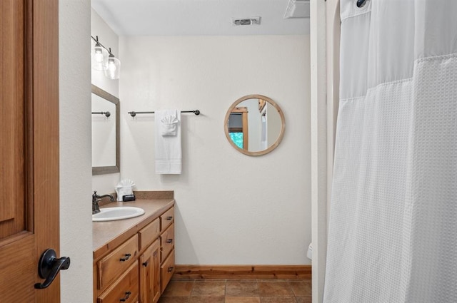 83 Bobber Rd, Broken Bow, OK 74728 - full bathroom featuring vanity and baseboards