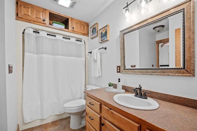 83 Bobber Rd, Broken Bow, OK 74728 - bathroom with vanity, toilet, shower / tub combo with curtain, and tile patterned floors
