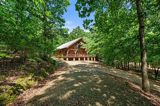 83 Bobber Rd, Broken Bow, OK 74728 - view of yard featuring a deck