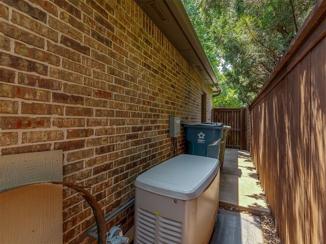 3122 Thornbrooke Blvd, Edmond, OK 73013 - exterior view of a power unit and brick siding