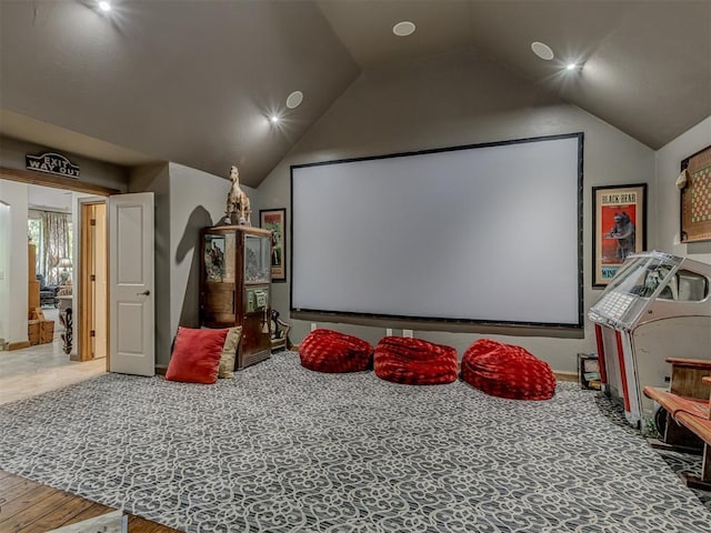 3122 Thornbrooke Blvd, Edmond, OK 73013 - home theater room with vaulted ceiling, recessed lighting, baseboards, and wood finished floors